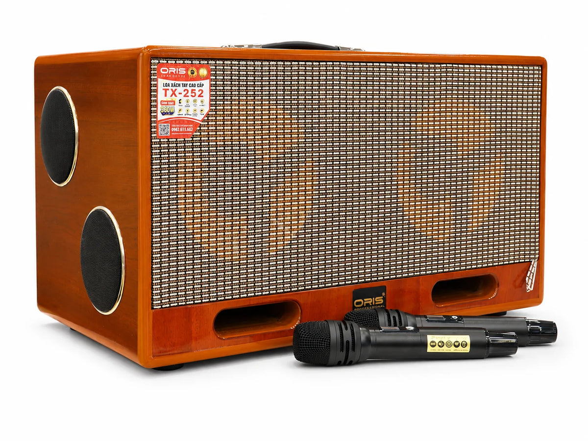 Oris TX 252 portable karaoke speaker in a wood cabinet with its two wireless microphones